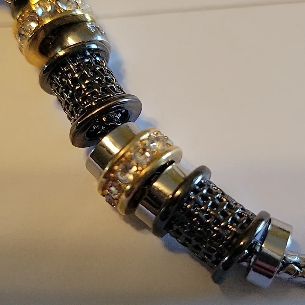 Silver chain with silver, gold, hematite & crystal beads adorn this bracelet - Picture 2 of 6